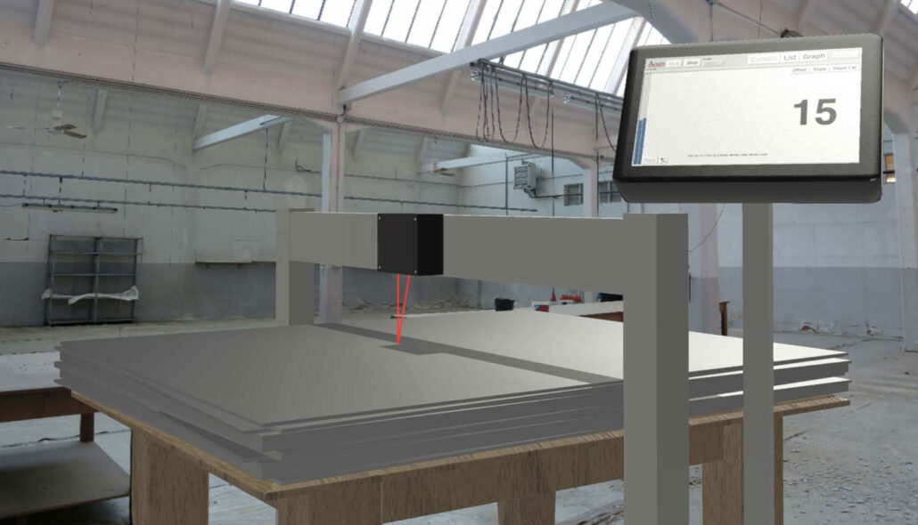 Counting stacked sheets with non-contact laser sensors